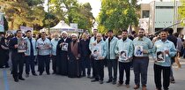 حضور جمعی از کارکنان و بسیجیان فولاد خوزستان مراسم تشییع شهدای خدمت